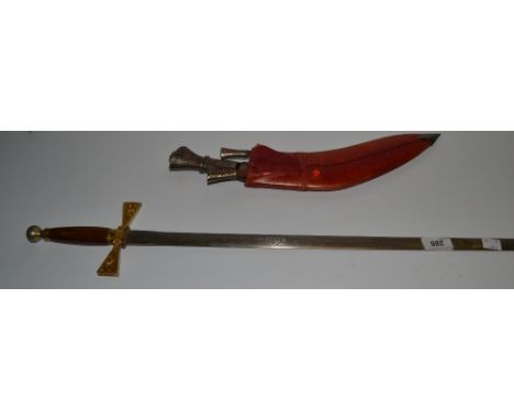 A tourist Kukri, leather scabbard;  a Wilkinson decorative promotional sword (2)