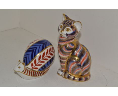 A Royal Crown Derby Tabby Cat paperweight, ceramic stopper, a Royal Crown Derby Garden Snail, ceramic stopper

 