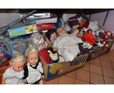 FIVE BOXES AND LOOSE TOYS, GAMES, AND DOLL'S HOUSE, to include a large collection of assorted modern soft toys, a quantity of