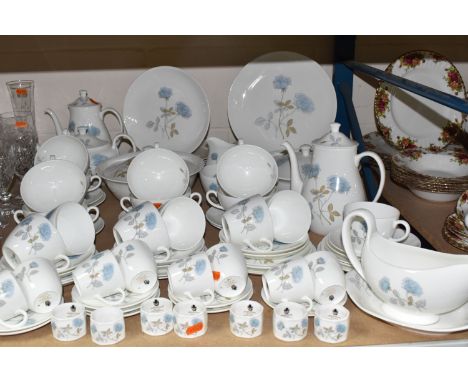 AN EIGHTY SIX PIECE WEDGWOOD ICE ROSE DINNER SERVICE, comprising two tureens, a sauceboat and stand, two coffee pots, a teapo