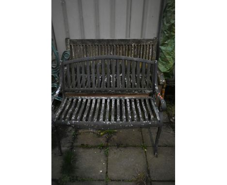AN ALUMINIUM GARDEN BENCH, length 105cm, along with a teak garden bench (condition report: both well weathered, finish flakin