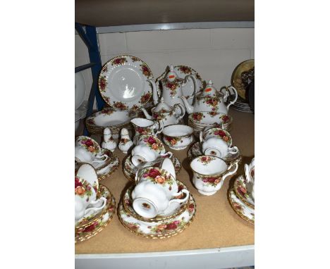 A SIXTY ONE PIECE ROYAL ALBERT OLD COUNTRY ROSES DINNER SERVICE, comprising a coffee pot, a teapot, a small teapot, a milk ju