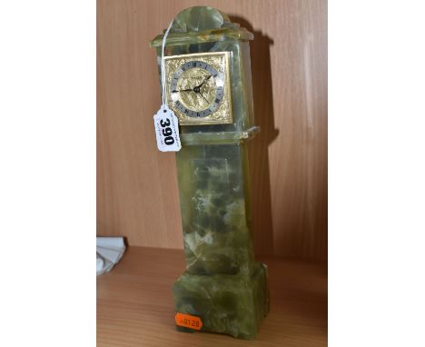 A GREEN ONYX ORNAMENTAL MINIATURE 'SWIZA' CLOCK height 28cm, with a plastic bevel, Arabic numerals to the clockface with reli