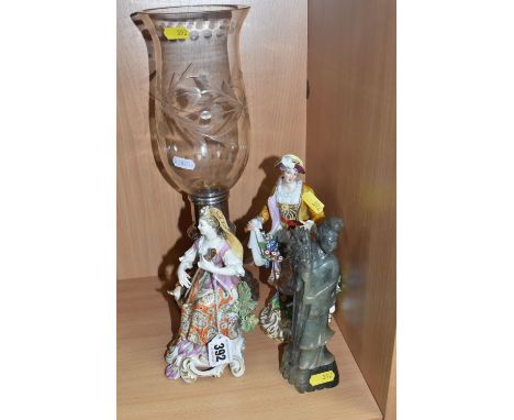 A NEPHRITE FIGURE OF GUANYIN, A PLATED CANDLESTICK, AND TWO CONTINENTAL FIGURES, to include a hand-carved nephrite figure of 