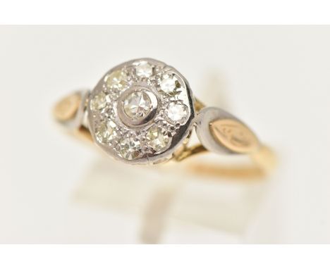A YELLOW METAL DIAMOND CLUSTER RING, of a circular form set with nine single cut diamonds, in a white metal mount, estimated 
