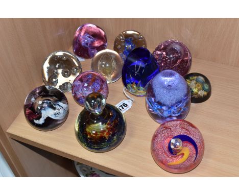 A COLLECTION OF PAPERWEIGHTS, twelve examples, to include a Caithness Scotland 'Tango', 'Pebble' no R51359, 'Whirlying', 'Pho
