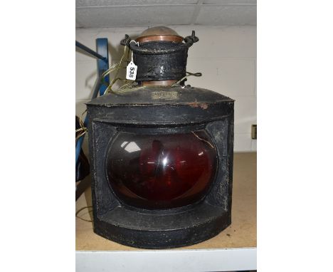 A LARGE SHIP'S METAL LANTERN, painted black and converted to electricity, oil lamp and brass reflector still inside lantern, 