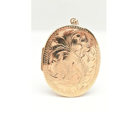 A 9CT GOLD LOCKET, a large yellow gold locket with embossed scrolling acanthus detail, fitted with a tapered bail, approximat