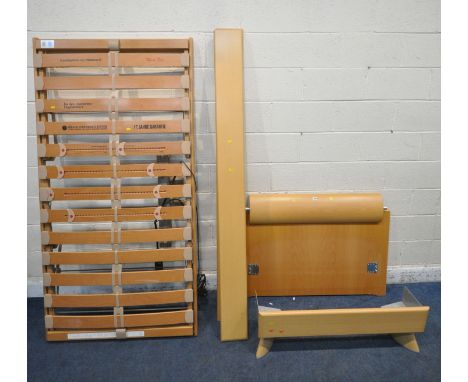 A HULSTA SINGLE BEDSTEAD, with motorised adjustable slats (condition report: side rails and bolts present)