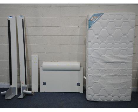 A HULSTA SINGLE MATTRESS, with a matching white bedstead (condition report: side rails, slats and bolts present, back of the 