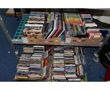 FOUR BOXES OF CDS AND DVDS to include two boxes of approximately fifty DVDS comprising various war, western, and comedy title