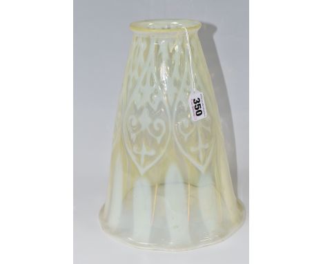 A VASELINE GLASS LIGHT SHADE, the uranium glass light shade of tapering bell form, with slightly wavy rim and petal-like patt