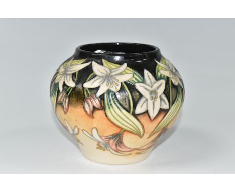 A MOORCROFT POTTERY LIMITED EDITION VASE, in the Scrambling Lily pattern by Anji Davenport, of squat bulbous form, tube lined