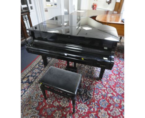 AN OFFENBACH GLOSSY BLACK 5FT3 OVERSTRUNG BABY GRAND PIANO, serial number G019297, the hinged lid enclosing the gold painted 