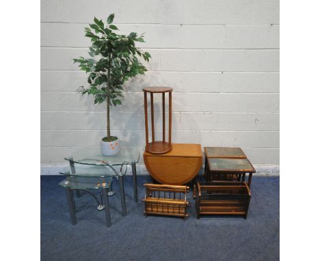 A TRIANGULAR GLASS NEST OF THREE TABLES, a small drop leaf table, two tile top magazine tables, two magazine racks, a synthet