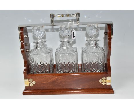 A MODERN PLATED TANTALUS WITH THREE SQUARE DECANTERS, height 33cm (to top of handle) x width 38cm x depth 14.5cm (1) (Conditi