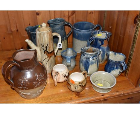 A GROUP OF STUDIO POTTERY to include a 'Lauriana' coffee pot, two mugs by Phillip Laureston with a design based on the Lascau