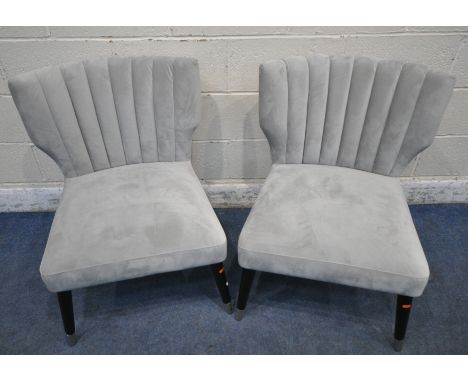 A PAIR OF LIGHT GREY PLUSH VELVET UPHOLSTERED CHAIRS, with shaped backrests, raised on cylindrical tapered legs, width 66cm x