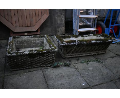 A WEATHERED COMPOSITE SQUARE PLANTER, with a basket weave design, 55cm squared x height 23cm, along with a rectangular wall m