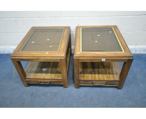 A PAIR OF HARDWOOD RECTANGULAR LAMP TABLES, with a glass insert, the undershelf fitted with a single drawer, signed Bassett, 