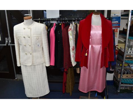 A LARGE QUANTITY OF LADIES CLOTHING, comprising evening jackets, overcoats, casual jackets, skirt suits, dresses and skirts, 