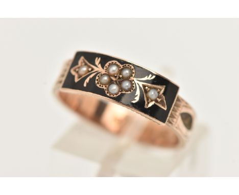 A LATE VICTORIAN SPLIT PEARL AND BLACK ENAMEL MEMORIAL RING, designed as a split pearl set flower within a black enamel surro