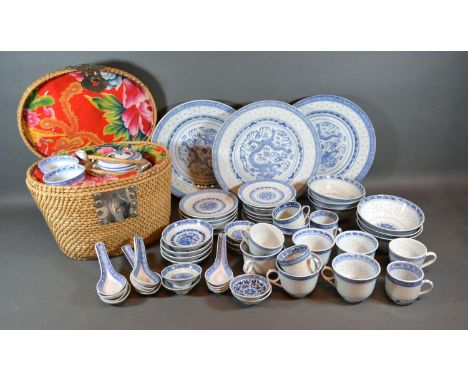 A Collection of Chinese Rice Pattern Ceramics to include cups and saucers, plates and a teapot with cups within basket 