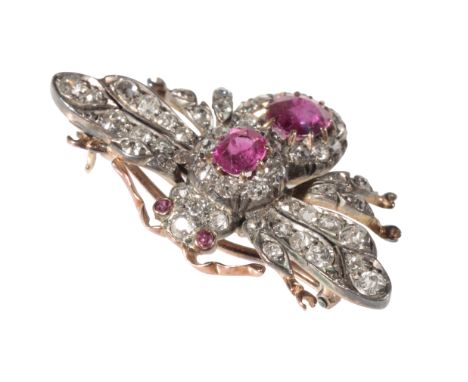 A VICTORIAN DIAMOND AND RUBY BEE BROCH set with round-cut diamonds and oval and round-cut rubies to its abdomen and eyes, win