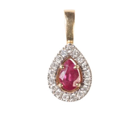 A RUBY AND DIAMOND PENDANT the central pear-cut ruby c. 0.5 carat, with a surround of sixteen round-cut diamonds, set in 18ct