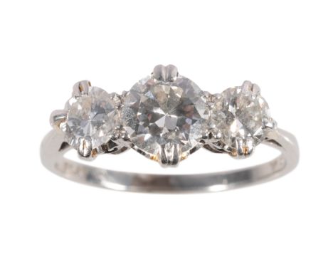 A THREE STONE DIAMOND RING three brilliant-cut diamonds, c.1.15ct total weight, on a platinum shank, ring size K