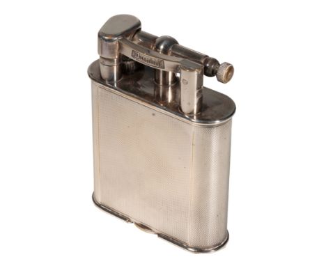 DUNHILL: A SILVER PLATED TABLE LIGHTER base stamped made in England, patent No 390107, registration design No 737418, stamped