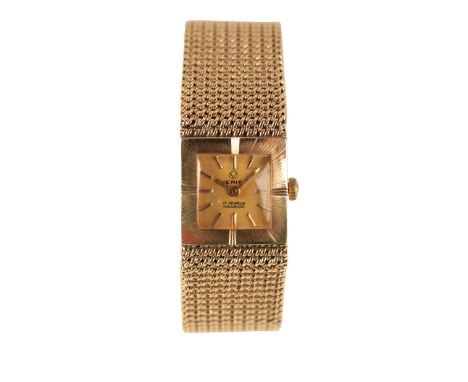 VERITY: A LADY'S 9CT GOLD BRACELET WATCH with manual wind movement, the gold dial with gold batten numerals and gold hands, c