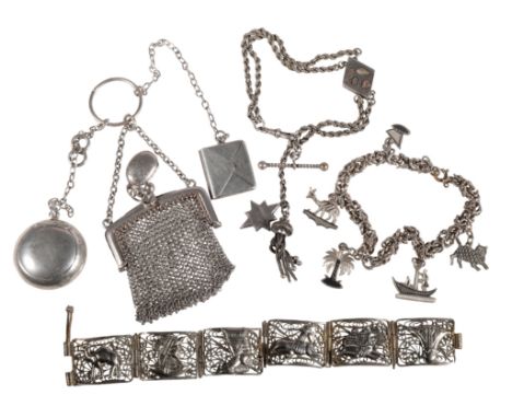 A SILVER CHATELAINE MESH PURSE stamp holder, and miniature circular compact, all chain linked to a ring, together with three 