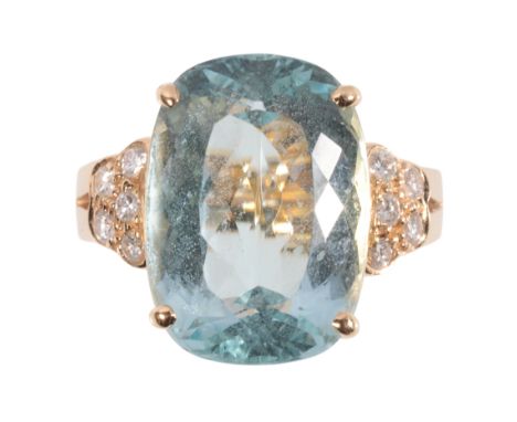 AN AQUAMARINE AND DIAMOND RING the facet-cut aquamarine, flanked either side with five brilliant-cut diamonds, on a yellow go