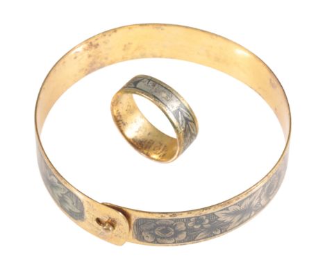 A "RUSSIAN" BANGLE AND MATCHING RING both on unmarked white and yellow metal, with foliage decoration, (2)