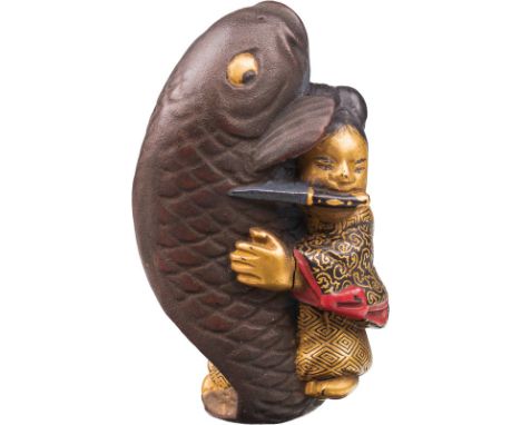  Netsuke, Mitte/Ende 19. Jh. Buchsbaumholz, diverse Lacke; der "göttliche Knabe" Kintaro mit einem Messer im Mund, im Begriff