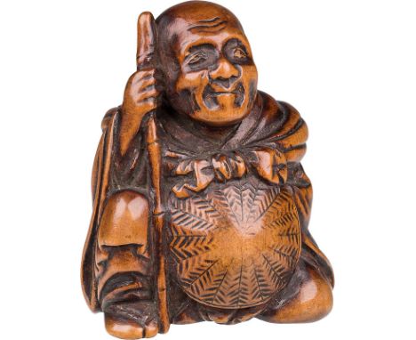  Netsuke, Anfang 19. Jh. Buchsbaumholz; Saigyo Hoshi, sitzend mit Stock und Strohhut, in froher Betrachtung des heiligen Berg