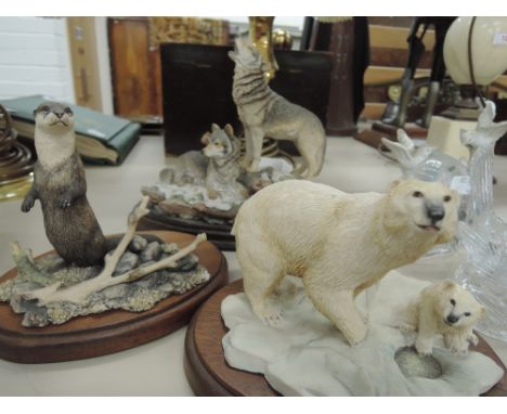 A Border Fine Art Polar Bear and Cub RW18, Otter WW2 and a Country Artists Wolf Pair CA544