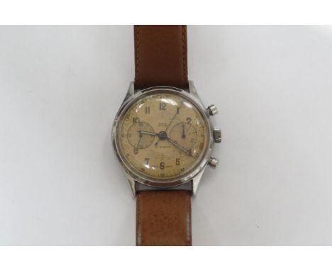 An Olma 'De Luxe' 17 jewels chronograph on leather strap 