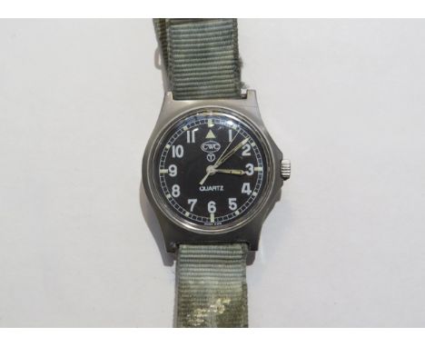 A Cabot Watch Company (CWC) military Quartz wristwatch, black dial with numerals. Back cover marked '6645.99' and '5415317' a