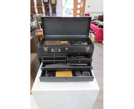 A Talxo tool box with assorted horolgical tools including punches, micronikers thread gauges, staking blocks and Mitutoyo Ver