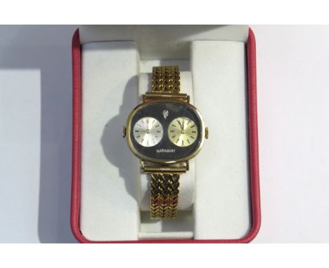 A Wittnauer duel time wristwatch with 17 jewel manual wind movement, discolouration to dial 