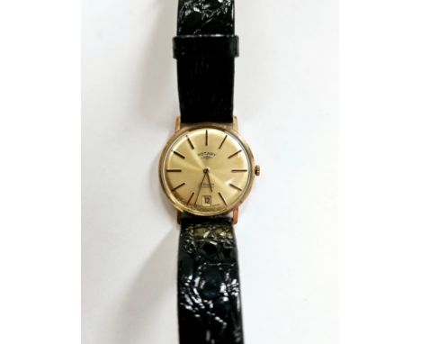 A Rotary 9ct gold cased manual wind gentleman's wristwatch, champagne dial with date at 6 o' clock, 17 jewel movement. Inside