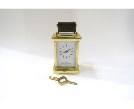 A late 20th Century Matthew Norman brass carriage clock, Switzerland movement marked 1754, presentation plaque to top 