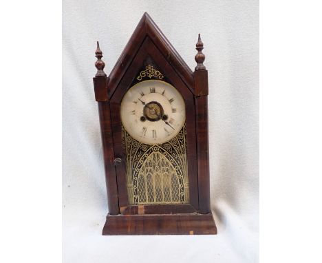 AN AMERICAN MAHOGANY CASED 'STEEPLE' SHELF CLOCK BY JEROME &amp; CO. with gothic transfer glass door, and alarm movement 39cm