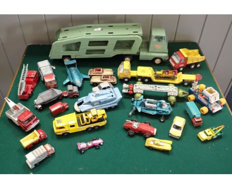 A TONKA TOY CAR TRANSPORTER with a collection of diecast models