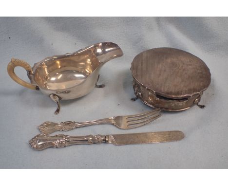 A SILVER TRINKET BOX with a silver sauce boat and silver knife and fork