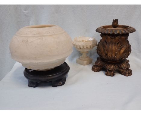 AN ACANTHUS CARVED WOODEN LAMP a Neoclassical alabaster light shade (damaged), and a similar urn (damaged)