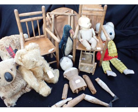 A PAIR OF DOLL'S CHAIRS, AND TABLE (poor condition), a distressed large 'Dutch' doll (missing limb), a Merrythought bear, a v