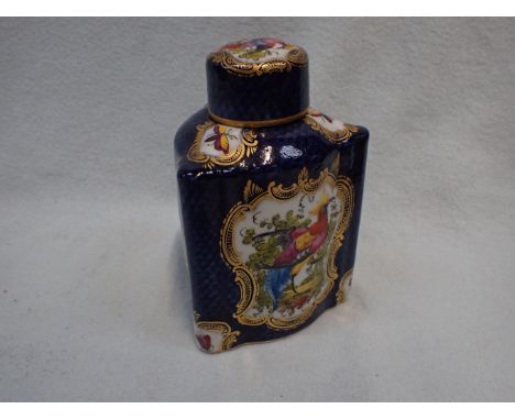 A 'PARIS' PORCELAIN CADDY of three-sided form, with birds and insects framed by gilt, within blue scale borders 15cm high